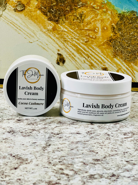 Two jars of Lavish Body Cream by The Jo 'Marie Collection, one with the lid on and one with the lid off, showing the product name and the 'Cocoa Cashmere' scent note on the labels.