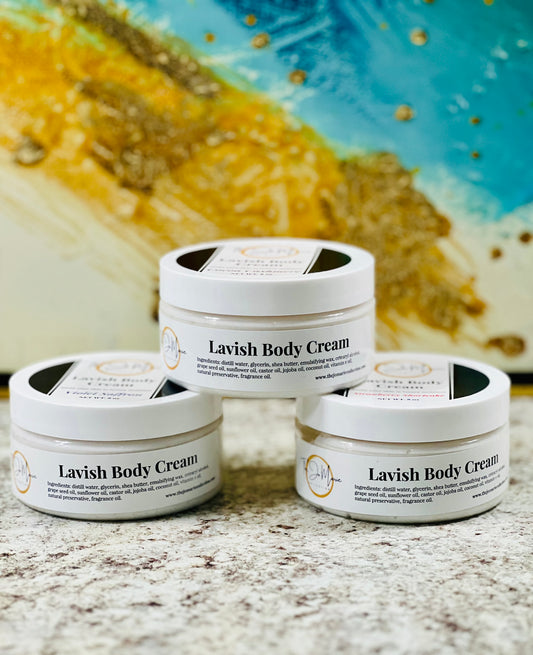 Three jars of Lavish Body Cream by The Jo 'Marie Collection, showing the product label and the name scent note on the labels.