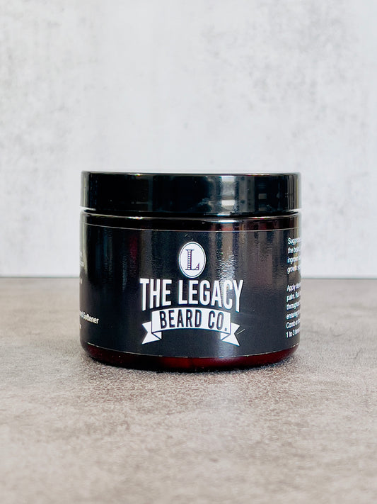 A jar of beard softener from The Legacy Beard Co. on a textured grey background.
